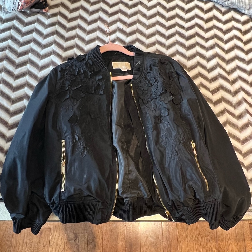 Michael Kors black bomber jacket with floral detailing